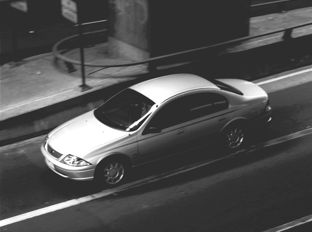 Black And White Car Under Bridge